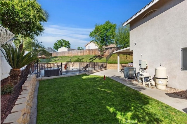 12427 Stardell Ln, Yucaipa, CA 92399 - view of yard with a patio area and central AC unit