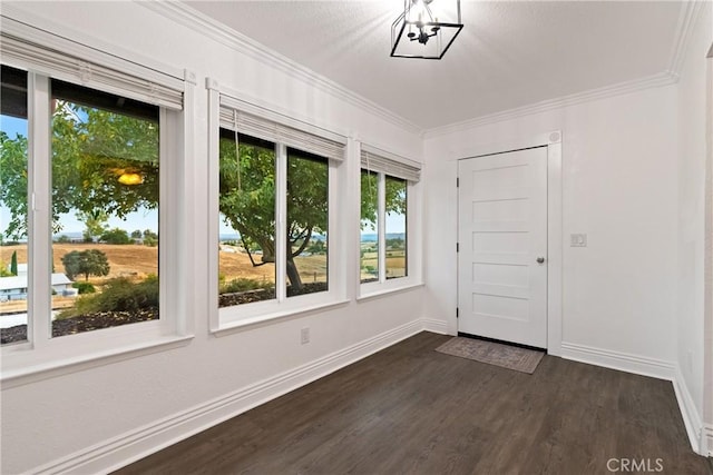 2245 Rancho Lomas Way, San Miguel, CA 93451 - entryway with ornamental molding, baseboards, dark wood-style flooring, and healthy amount of natural light