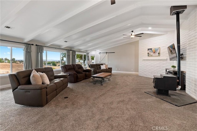 2245 Rancho Lomas Way, San Miguel, CA 93451 - carpeted living room featuring a wood stove, baseboards, and ceiling fan