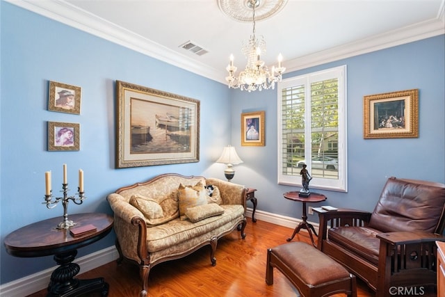 34130 Camelina St, Lake Elsinore, CA 92532 - living area with a chandelier, ornamental molding, baseboards, and wood finished floors