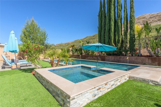 34130 Camelina St, Lake Elsinore, CA 92532 - view of pool featuring an in-ground hot tub, a mountain view, and a patio area