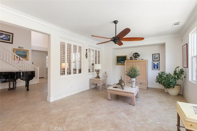 34130 Camelina St, Lake Elsinore, CA 92532 - living room with a ceiling fan, stairway, crown molding, baseboards, and light tile patterned floors