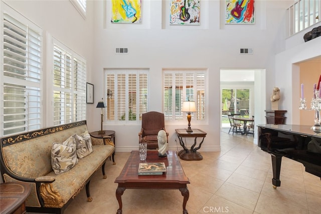 34130 Camelina St, Lake Elsinore, CA 92532 - tiled living area with a high ceiling and baseboards