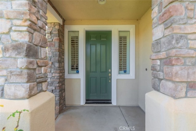 34130 Camelina St, Lake Elsinore, CA 92532 - property entrance with stone siding and stucco siding