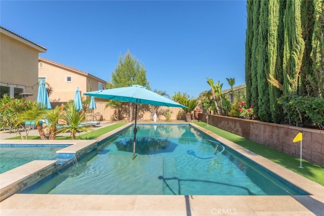 34130 Camelina St, Lake Elsinore, CA 92532 - view of pool featuring a fenced backyard and a pool with connected hot tub