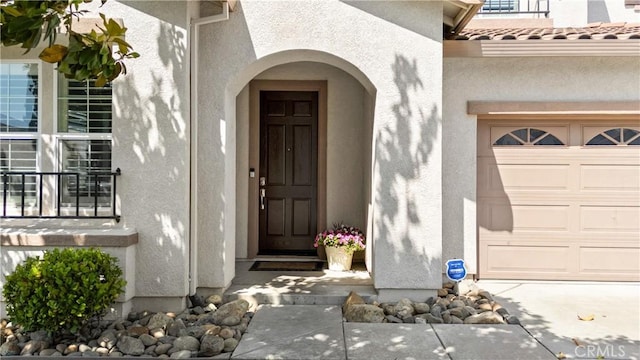 1689 Hometown Ln, Manteca, CA 95337 - entrance to property featuring stucco siding and a garage