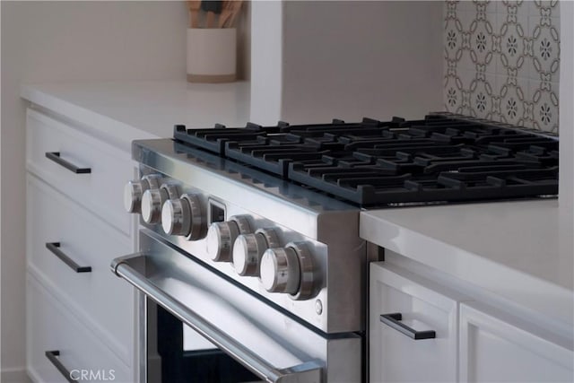 3448 Ferncroft Rd, Los Angeles, CA 90039 - kitchen view of high end stainless steel range and white cabinetry