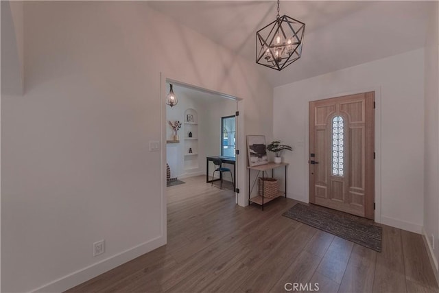 3448 Ferncroft Rd, Los Angeles, CA 90039 - foyer featuring vaulted ceiling, a chandelier, wood finished floors, baseboards, and healthy amount of natural light