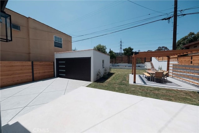 3448 Ferncroft Rd, Los Angeles, CA 90039 - view of yard featuring an outdoor structure, a detached garage, and a patio area