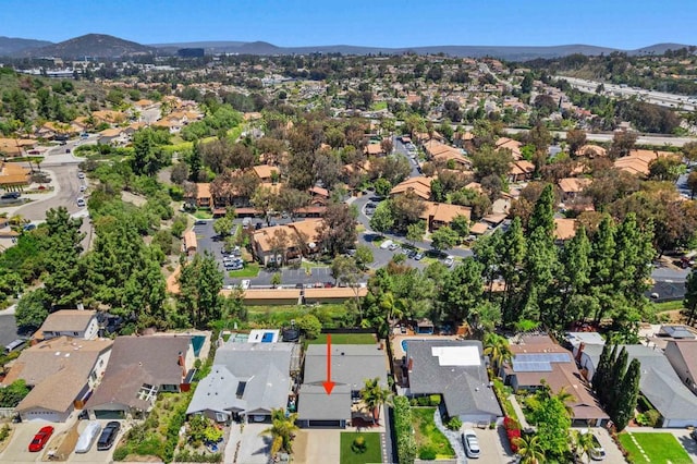15576 Paseo Ajanta, San Diego, CA 92129 - aerial view of property's location with nearby suburban area and a mountainous background