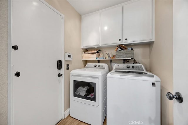 19836 White Spring Ln, Yorba Linda, CA 92886 - washroom with separate washer and dryer, cabinet space, and light wood-type flooring