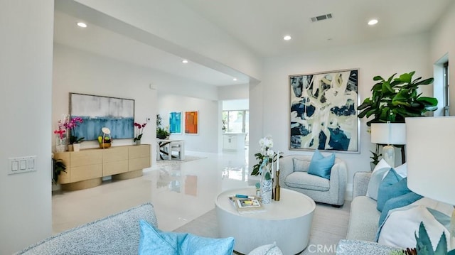 living area featuring recessed lighting