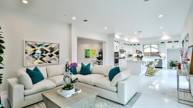 living room featuring recessed lighting