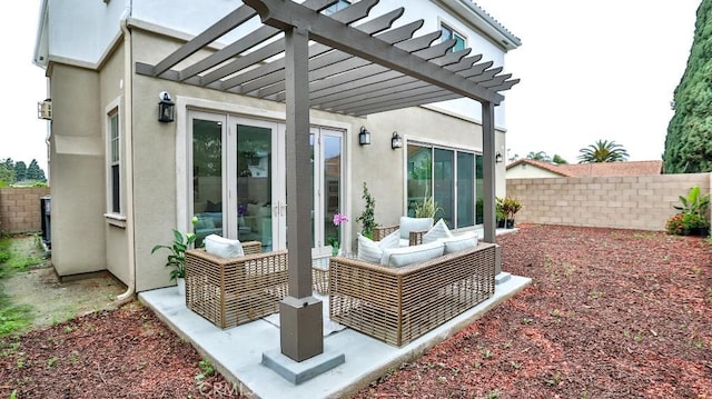 view of patio with fence and a pergola