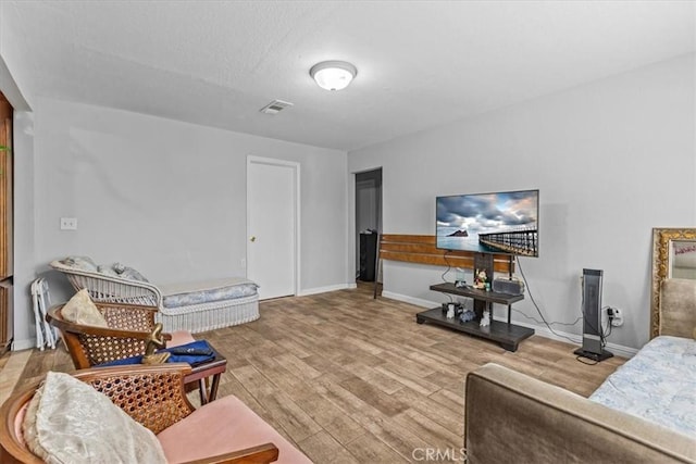 9502 Westminster Ave, Garden Grove, CA 92844 - living area with wood finished floors and baseboards