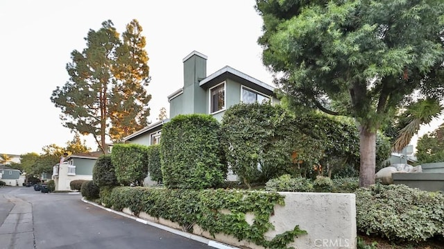 86069 Village Unit 69, Costa Mesa, CA 92626 - view of side of home with stucco siding
