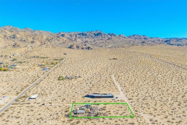 7037 Calapooya Way, Joshua Tree, CA 92252 - overview of rural landscape featuring a desert landscape, mountains, and property parcel outlined