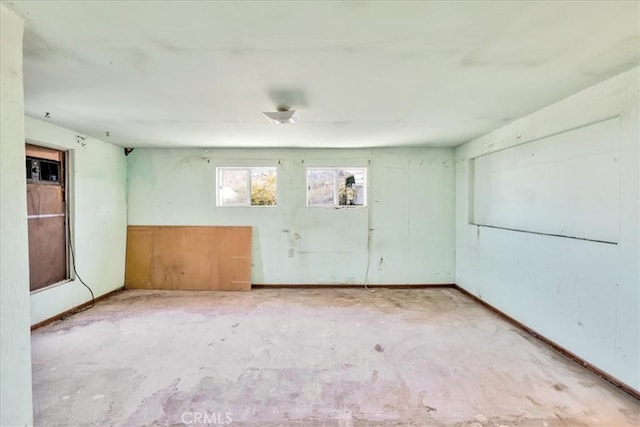 7037 Calapooya Way, Joshua Tree, CA 92252 - spare room featuring unfinished concrete floors