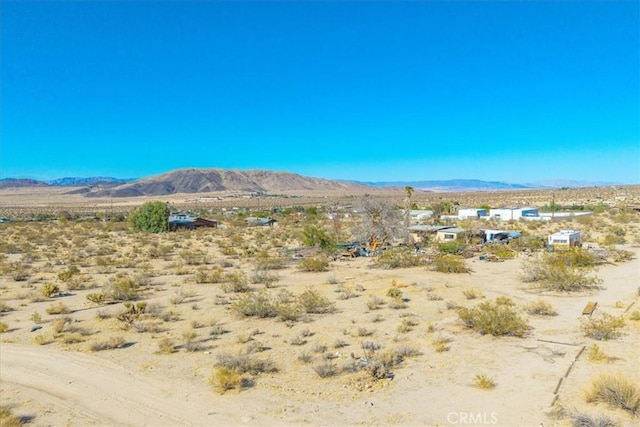 7037 Calapooya Way, Joshua Tree, CA 92252 - mountain view featuring a desert landscape and rural landscape