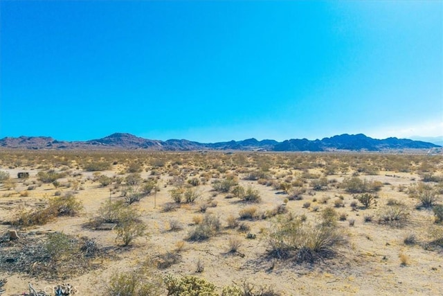 7037 Calapooya Way, Joshua Tree, CA 92252 - view of mountain background featuring a desert landscape and rural landscape