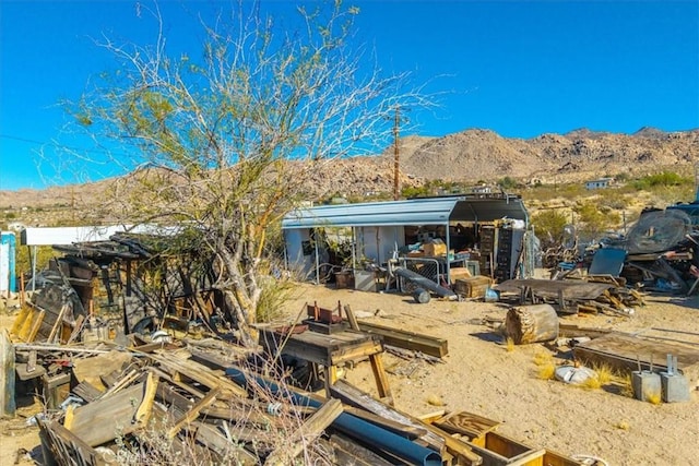 7037 Calapooya Way, Joshua Tree, CA 92252 - back of property featuring a mountain view