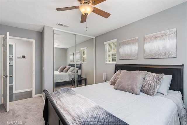 893 Whimbrel Way, Perris, CA 92571 - carpeted bedroom with a closet, baseboards, and ceiling fan