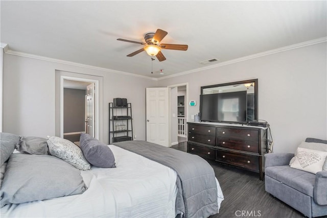 893 Whimbrel Way, Perris, CA 92571 - bedroom featuring dark wood finished floors, ornamental molding, and a ceiling fan