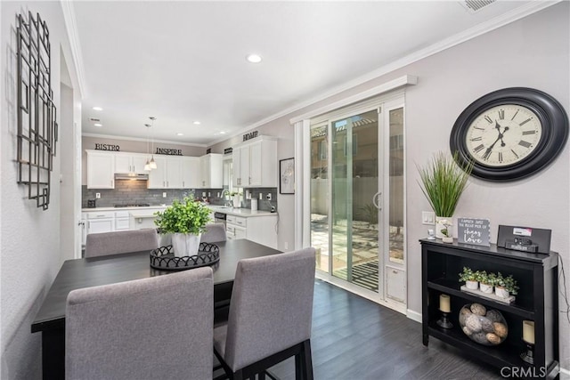 893 Whimbrel Way, Perris, CA 92571 - dining area featuring ornamental molding, dark wood-style flooring, recessed lighting, and baseboards
