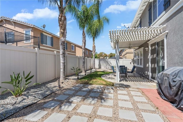 893 Whimbrel Way, Perris, CA 92571 - fenced backyard with a pergola, ceiling fan, a patio area, a residential view, and grilling area