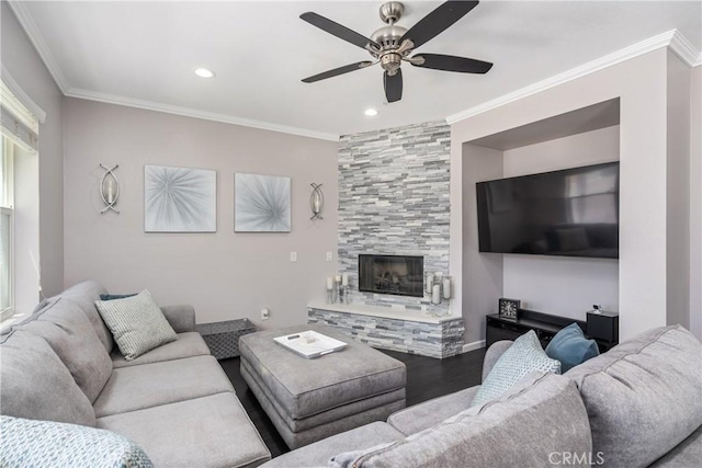 893 Whimbrel Way, Perris, CA 92571 - living room with a ceiling fan, wood finished floors, recessed lighting, crown molding, and a fireplace