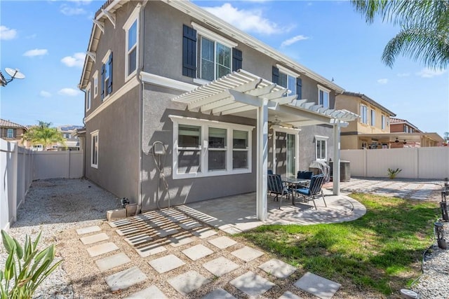 893 Whimbrel Way, Perris, CA 92571 - back of property featuring stucco siding, a pergola, a fenced backyard, a patio area, and central air condition unit