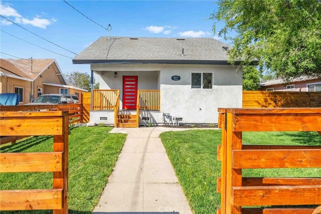 3017 Date St, Riverside, CA 92507 - bungalow-style home with stucco siding, roof with shingles, and covered porch
