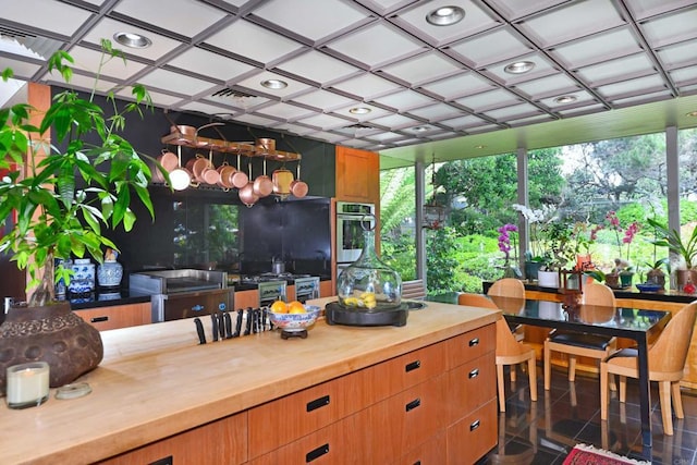 567 Gage Ln, San Diego, CA 92106 - kitchen with butcher block counters, stainless steel oven, and recessed lighting