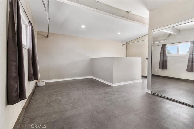 38868 Yucca Tree St, Palmdale, CA 93551 - spare room with vaulted ceiling, baseboards, recessed lighting, and tile patterned floors