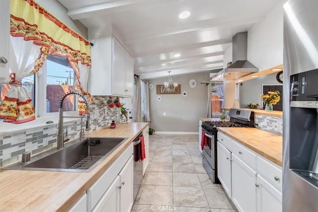 38868 Yucca Tree St, Palmdale, CA 93551 - kitchen with stainless steel appliances, a sink, backsplash, white cabinetry, and recessed lighting