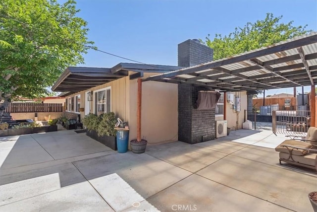38868 Yucca Tree St, Palmdale, CA 93551 - view of patio featuring a carport