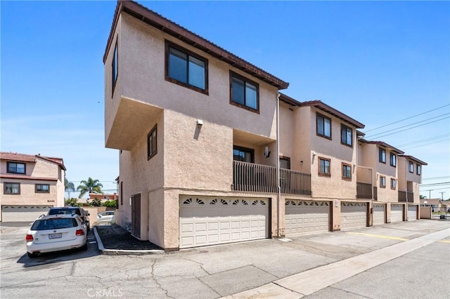 20815 Norwalk Blvd Unit 6, Lakewood, CA 90715 - rear view of property with stucco siding