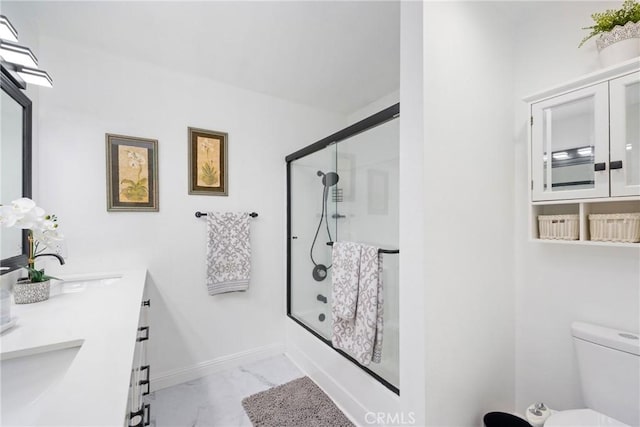 20815 Norwalk Blvd Unit 6, Lakewood, CA 90715 - full bath featuring marble look tiles, double vanity, enclosed tub / shower combo, and toilet