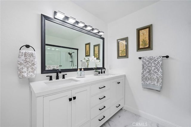 20815 Norwalk Blvd Unit 6, Lakewood, CA 90715 - full bath featuring marble finish flooring, a shower stall, double vanity, and baseboards