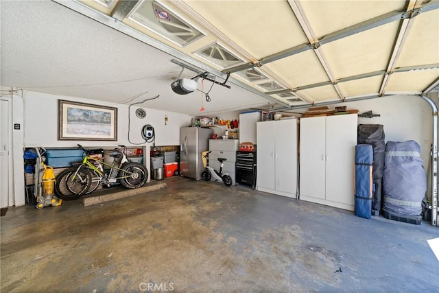 20815 Norwalk Blvd Unit 6, Lakewood, CA 90715 - garage featuring stainless steel fridge