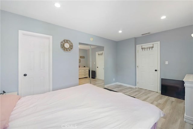 6916 Claire Ave, Reseda, CA 91335 - bedroom featuring light wood finished floors, recessed lighting, a closet, and baseboards