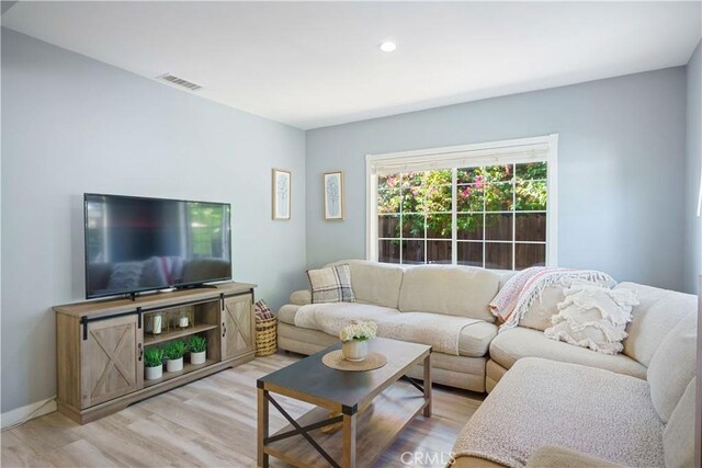 6916 Claire Ave, Reseda, CA 91335 - living area with light wood finished floors and recessed lighting