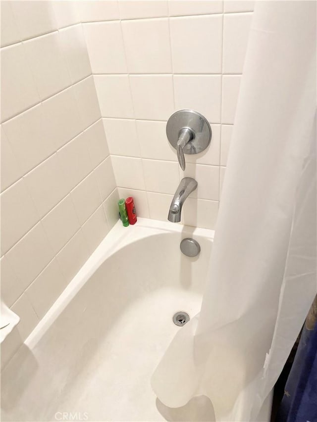299 E Arrow Hwy Unit 4, Glendora, CA 91740 - bathroom view of shower / bathtub combination with curtain