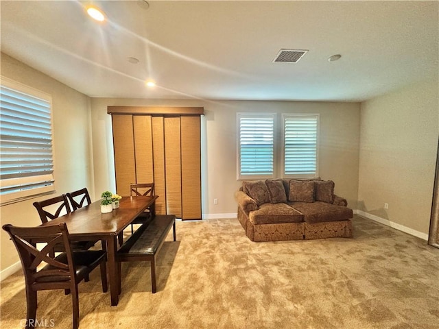 299 E Arrow Hwy Unit 4, Glendora, CA 91740 - dining space featuring baseboards and light carpet
