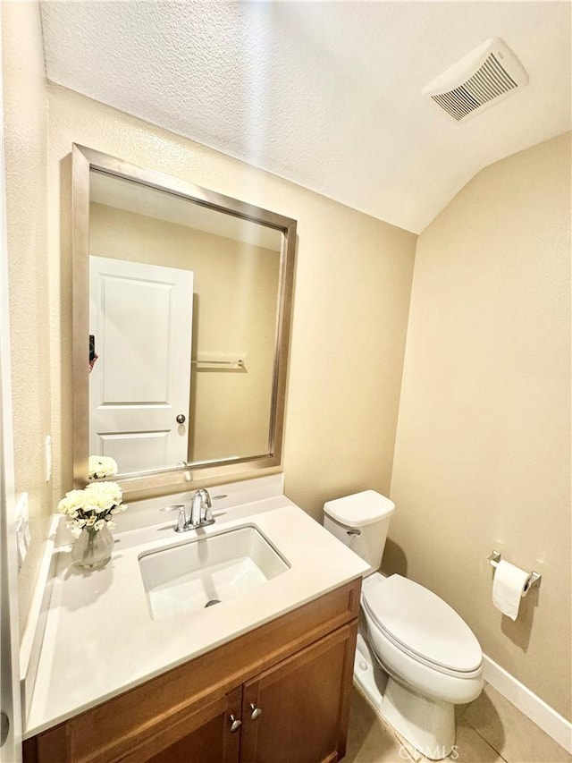 299 E Arrow Hwy Unit 4, Glendora, CA 91740 - half bath featuring vanity, toilet, tile patterned flooring, and baseboards