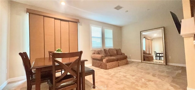 299 E Arrow Hwy Unit 4, Glendora, CA 91740 - carpeted dining room featuring baseboards