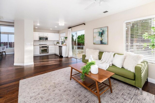 3362 Edgeview, San Marcos, CA 92078 - living room featuring dark wood finished floors, ceiling fan, baseboards, and recessed lighting