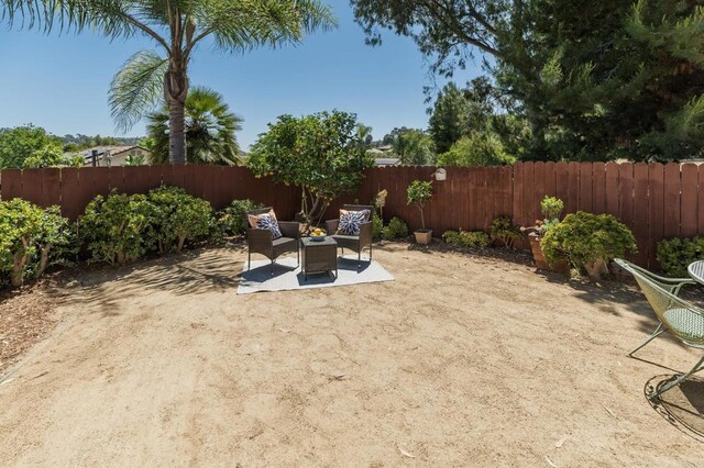 3362 Edgeview, San Marcos, CA 92078 - fenced backyard with a patio and an outdoor living space