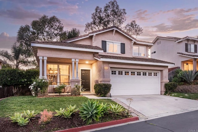 3362 Edgeview, San Marcos, CA 92078 - view of front of property featuring concrete driveway, stucco siding, a garage, a porch, and a tiled roof