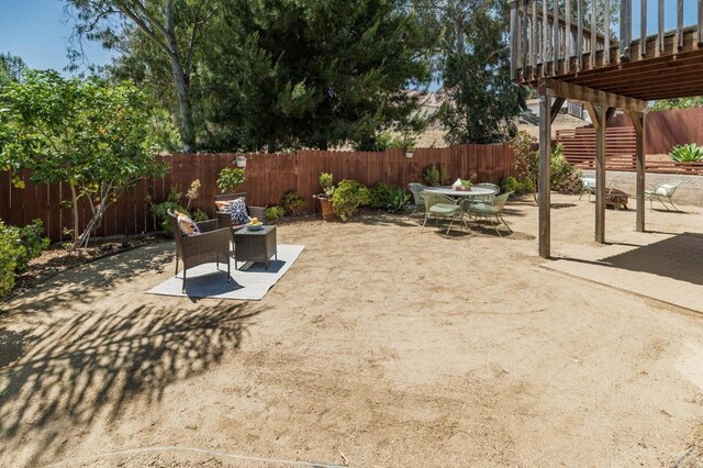 3362 Edgeview, San Marcos, CA 92078 - fenced backyard featuring a patio and outdoor dining space